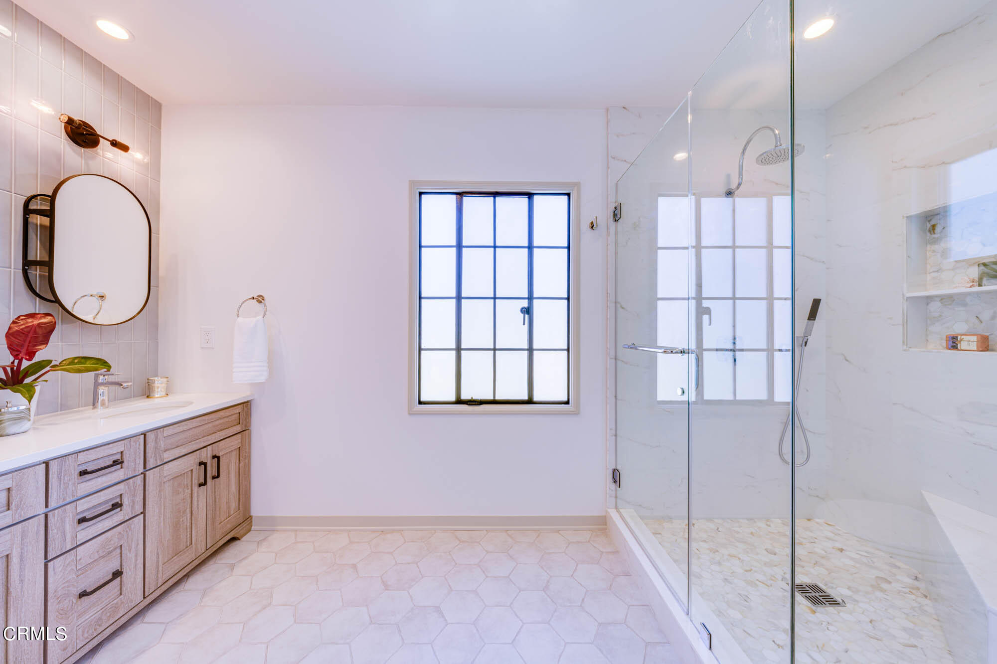 2709 Deodar Circle Pasadena, CA 91107 - Photo 24 of 43 a spacious bathroom with a double vanity sink and a mirror