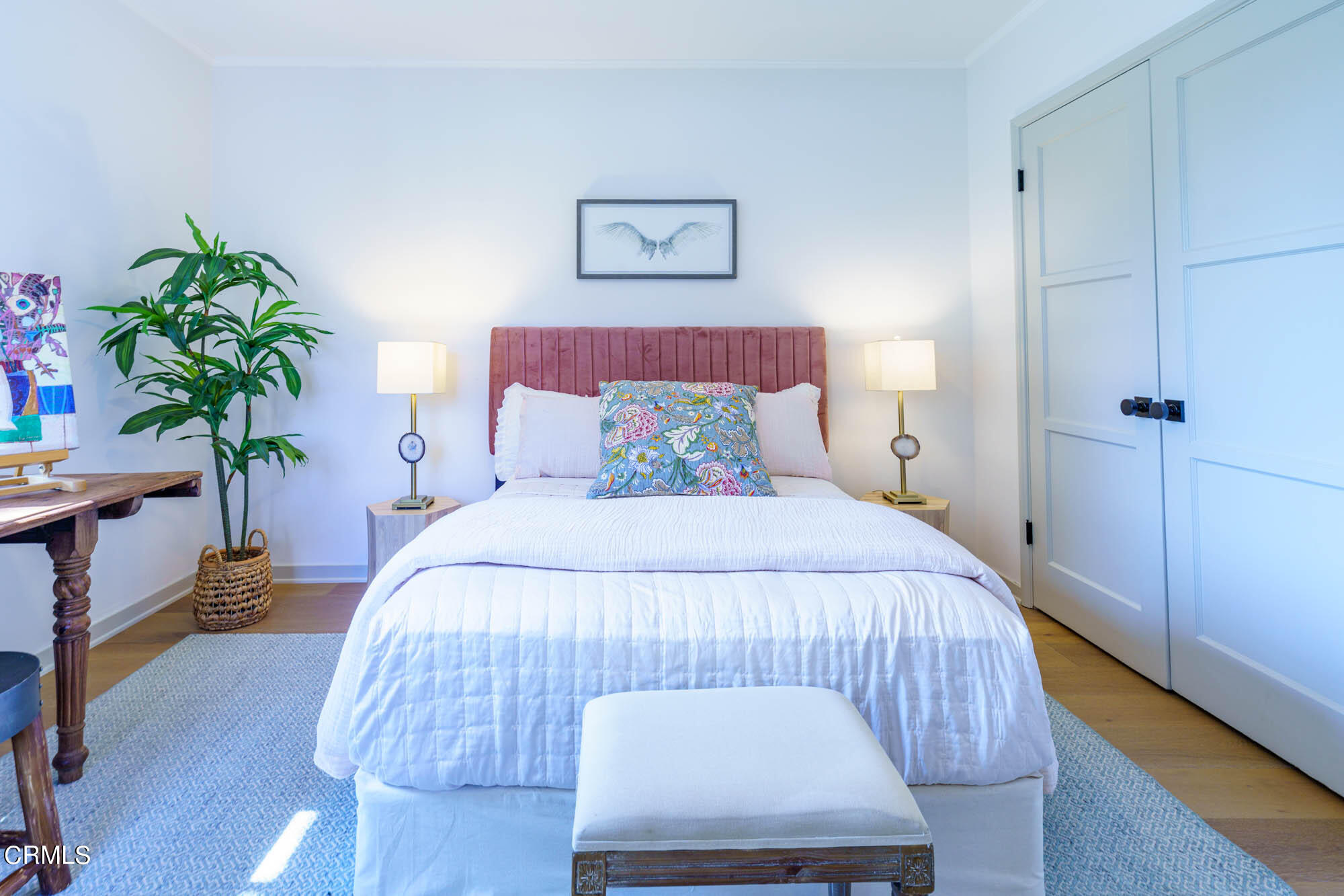 2709 Deodar Circle Pasadena, CA 91107 - Photo 28 of 43 a bedroom with a bed and a potted plant