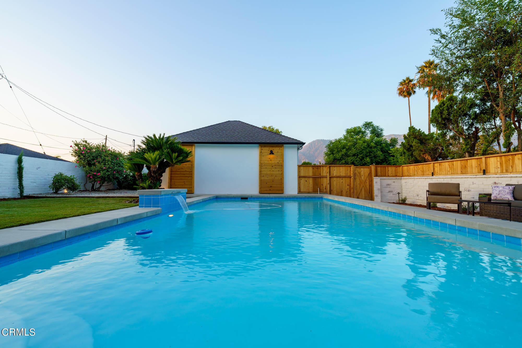 2709 Deodar Circle Pasadena, CA 91107 - Photo 34 of 43 a swimming pool with outdoor seating and yard