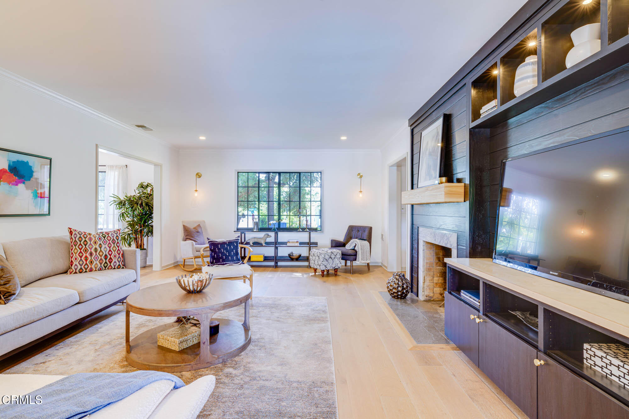 2709 Deodar Circle Pasadena, CA 91107 - Photo 8 of 43 a living room with furniture fireplace and a flat screen tv