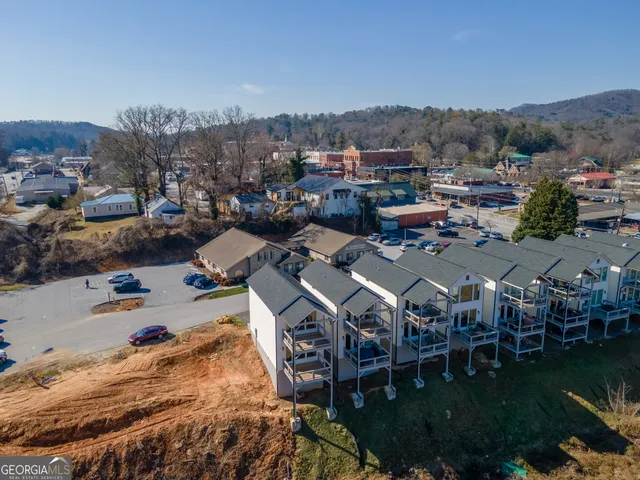 a view of a lake in middle of the town