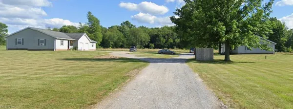 $599,900 | 8492-8476 Tallmadge Road, Diamond, OH 44412