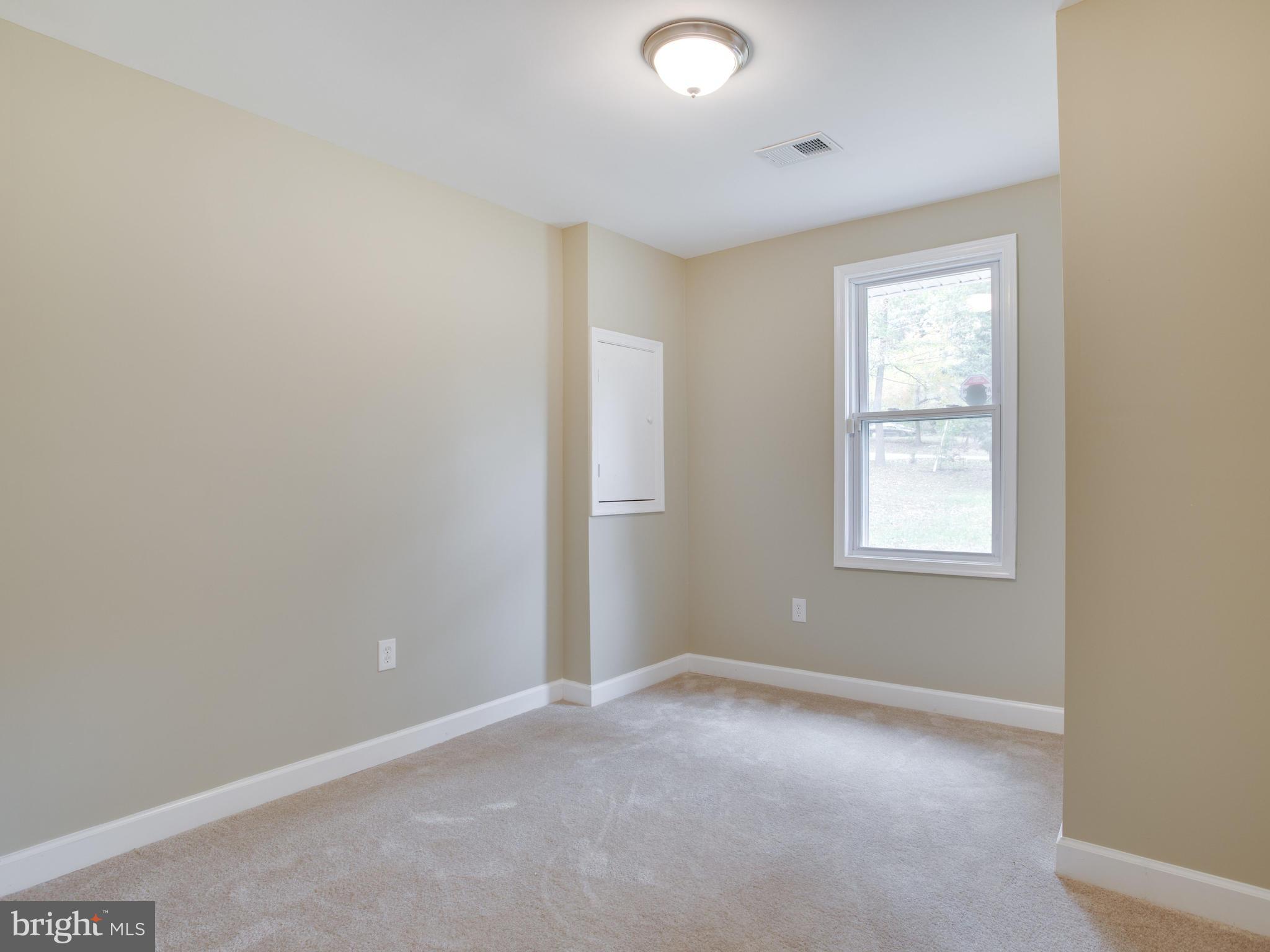 3411 Oaklawn Road Fort Washington, MD 20744 - Photo 17 of 30 an empty room with a window