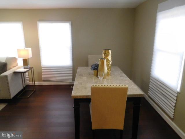 3411 Oaklawn Road Fort Washington, MD 20744 - Photo 24 of 30 a kitchen with a sink a stove and a window