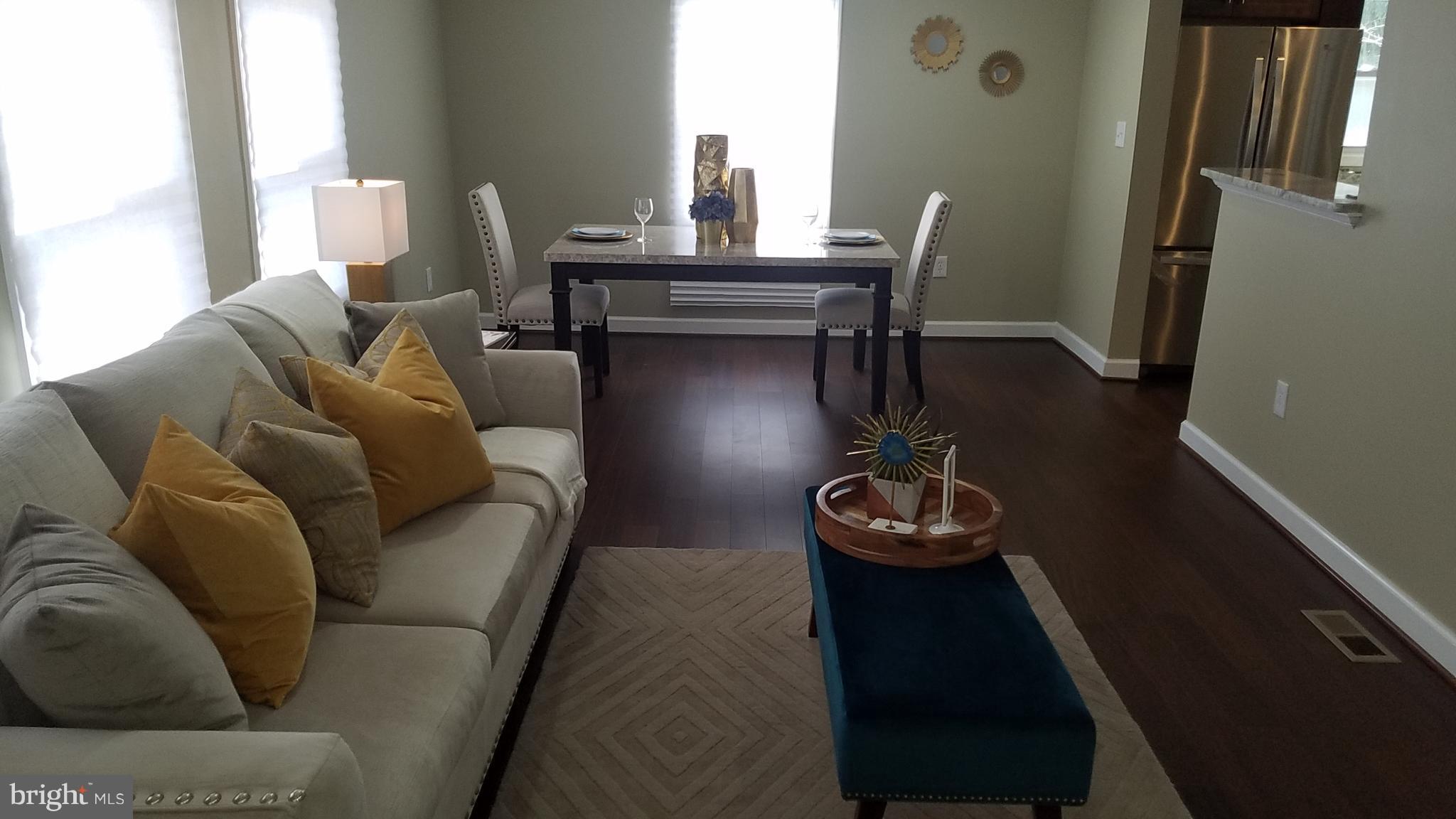 3411 Oaklawn Road Fort Washington, MD 20744 - Photo 29 of 30 a living room with furniture and a window