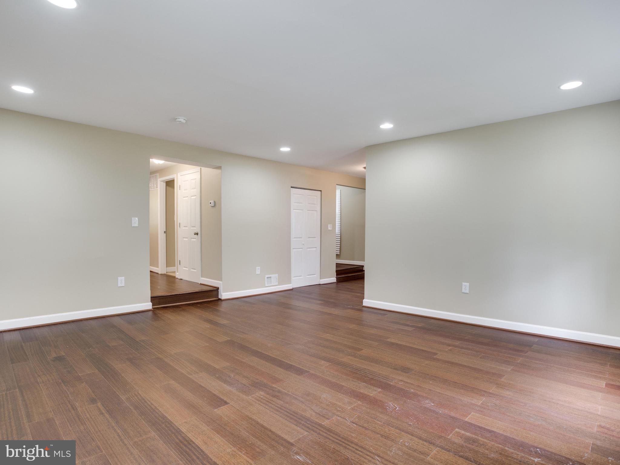 3411 Oaklawn Road Fort Washington, MD 20744 - Photo 8 of 30 a view of an empty room with wooden floor