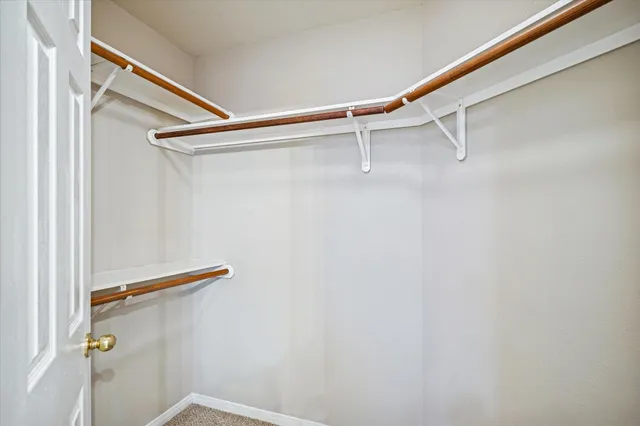 a view of a room with rack on the wall