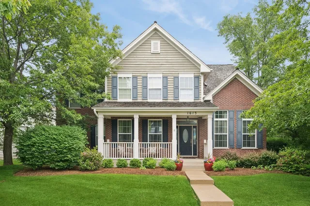 front view of a house and a yard