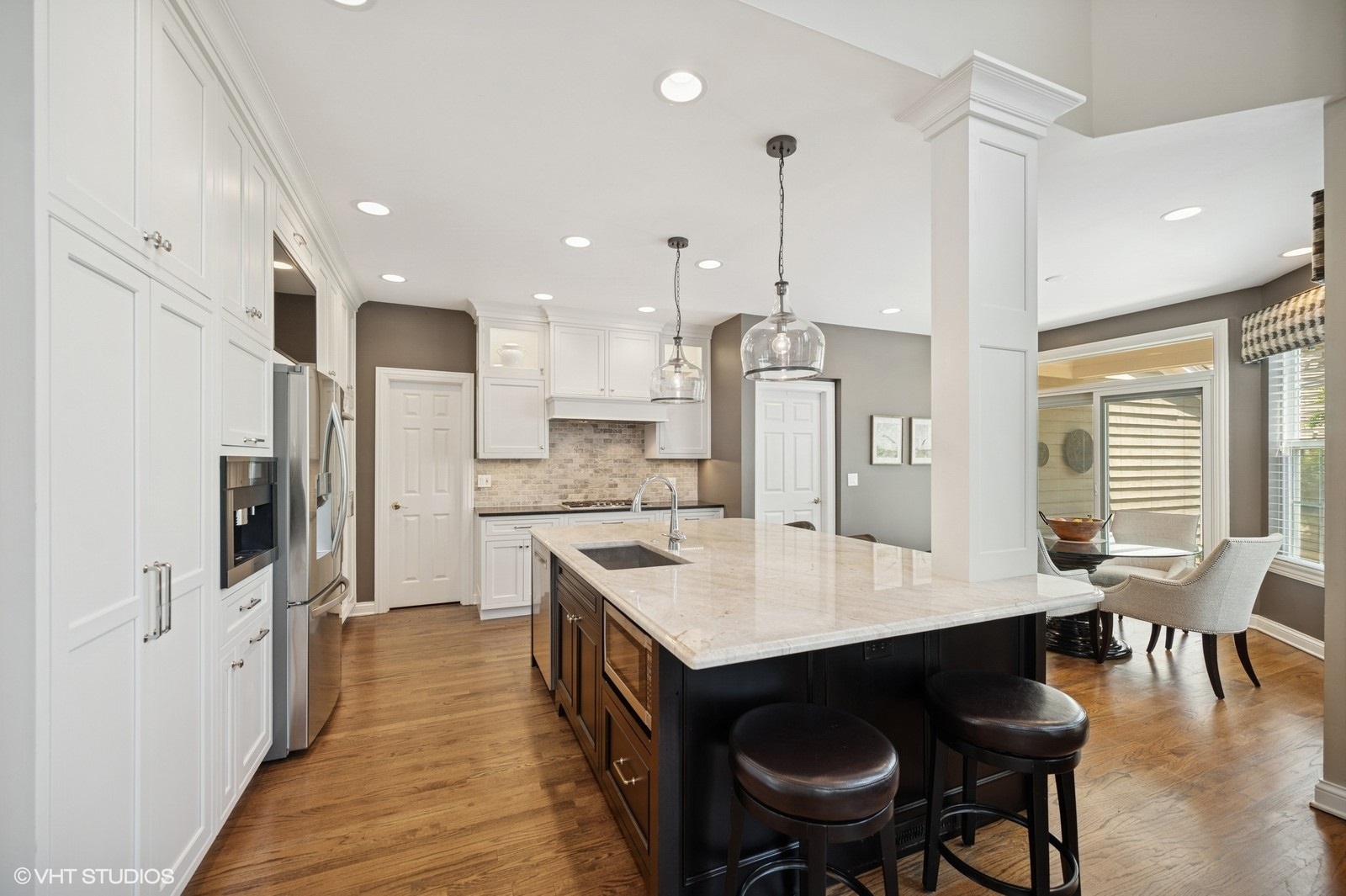 1613 Constitution Drive Glenview, IL 60026 - Photo 13 of 40 a large kitchen with a table and chairs