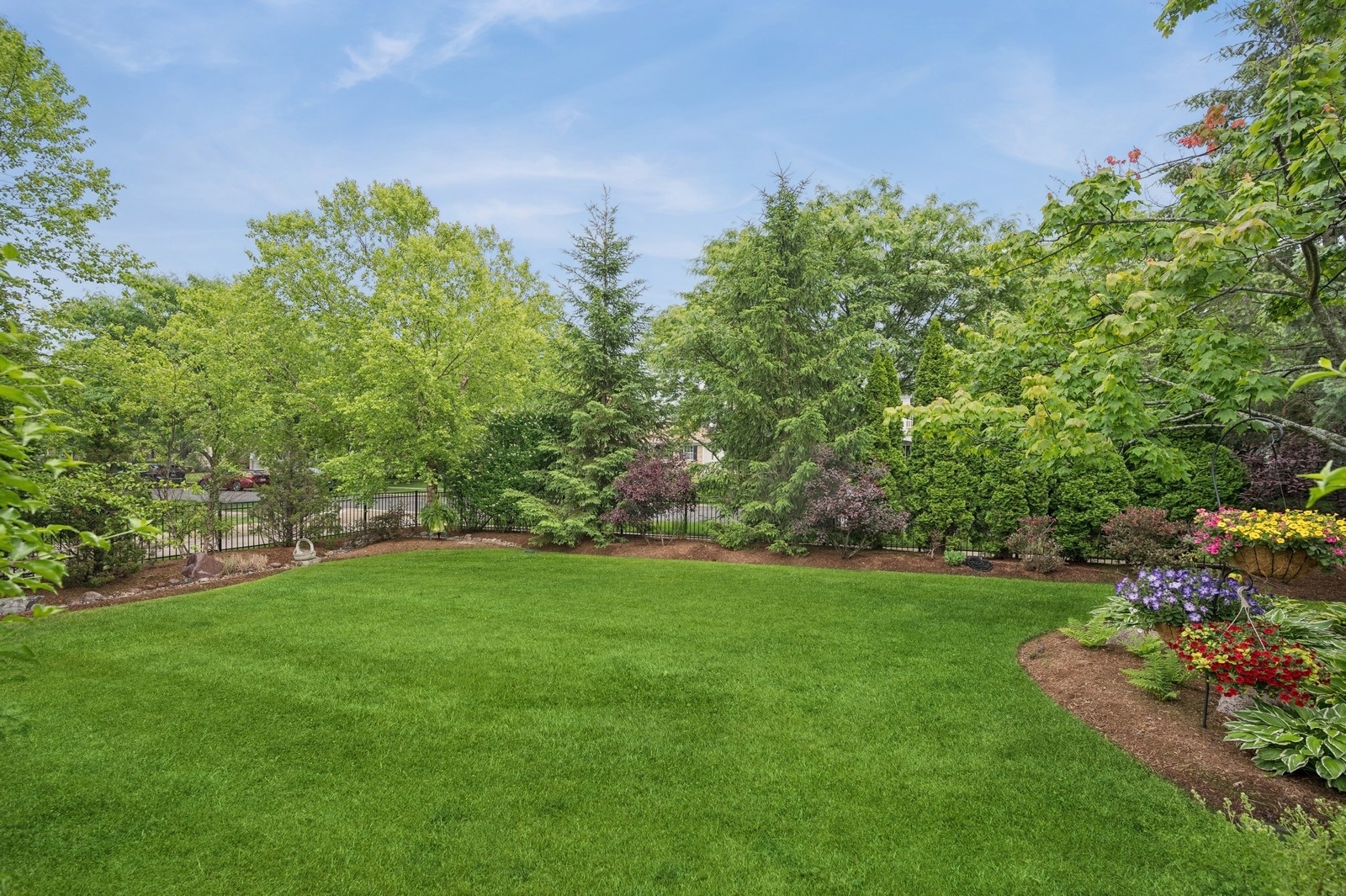 1613 Constitution Drive Glenview, IL 60026 - Photo 35 of 40 a view of a garden with a tree