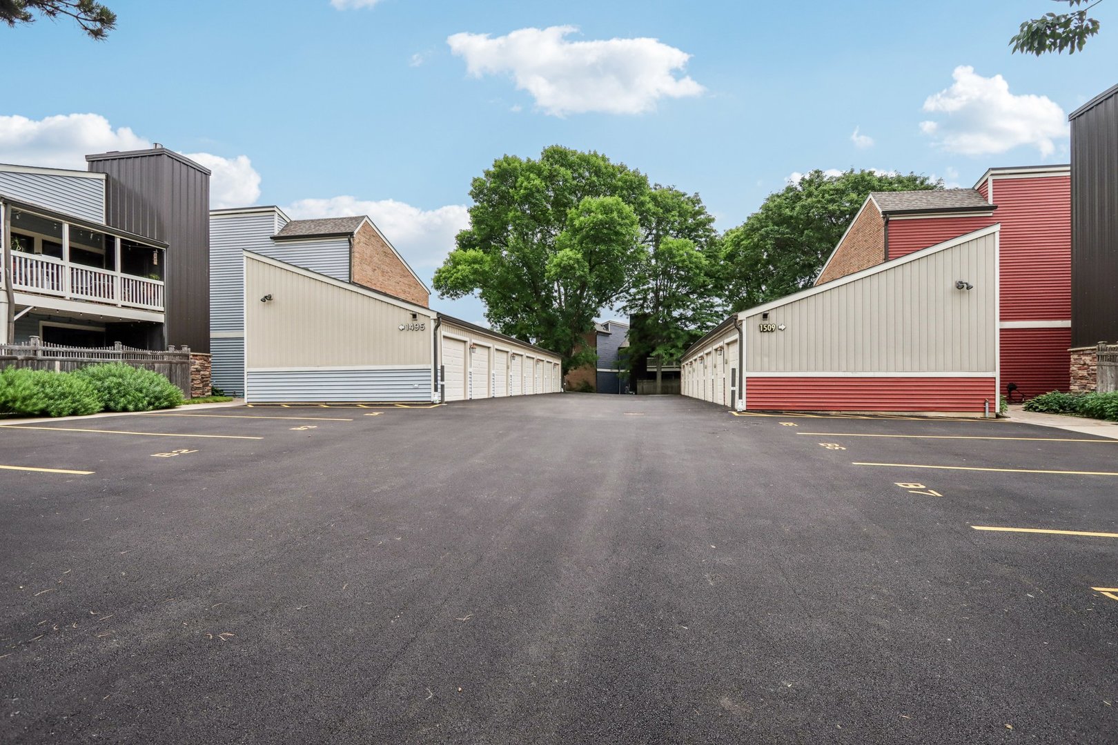 1495 South County Farm Road, Unit 24 Wheaton, IL 60189 - Photo 24 of 26 a view of a house with a street