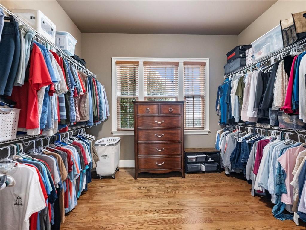6147 Golf View Court Jefferson, GA 30549 - Photo 27 of 73 a view of walk in closet with clothes and shoes