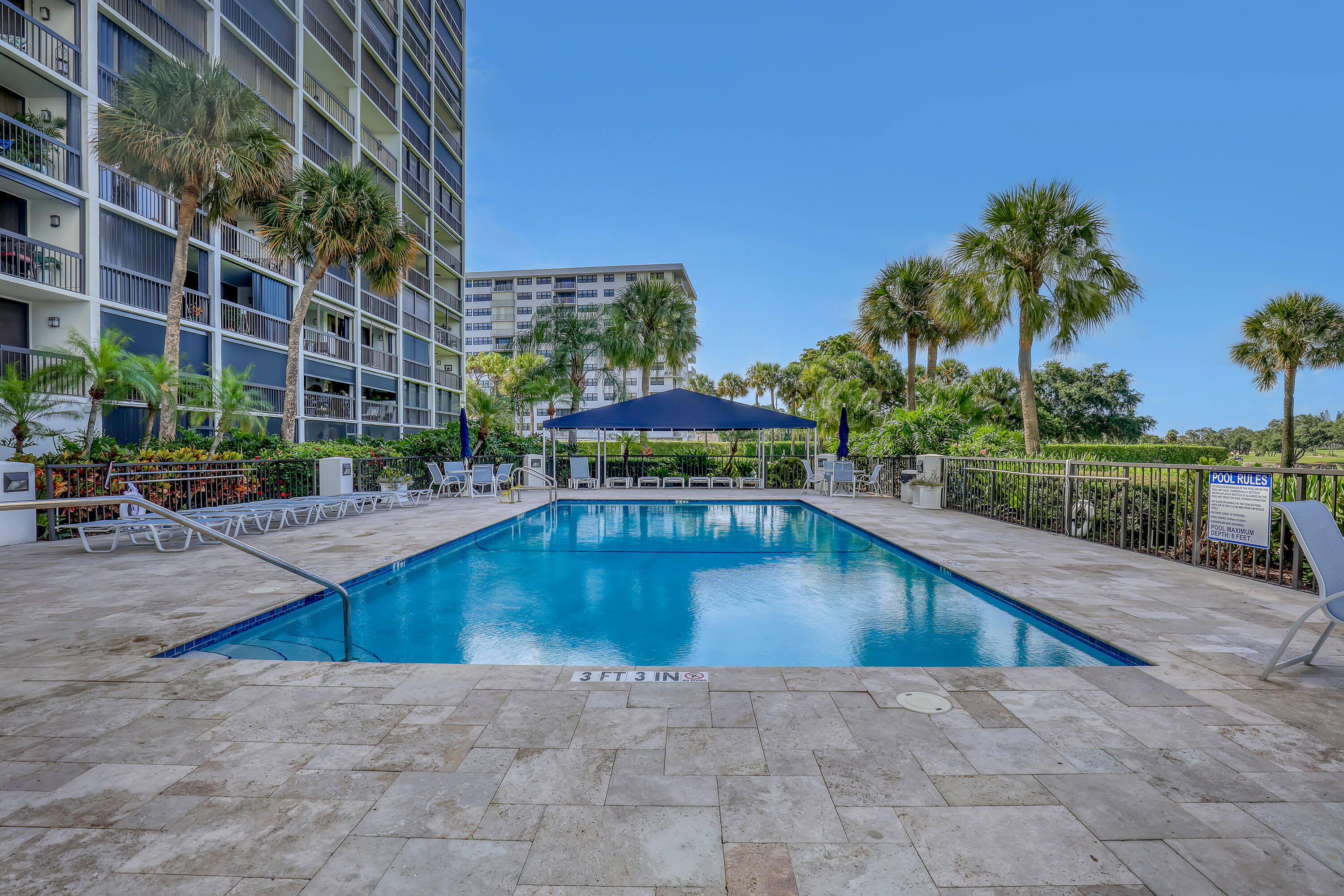 356 Golfview Road, Unit 403 North Palm Beach, FL 33408 - Photo 23 of 25 Resort Pool & Golf Course Views