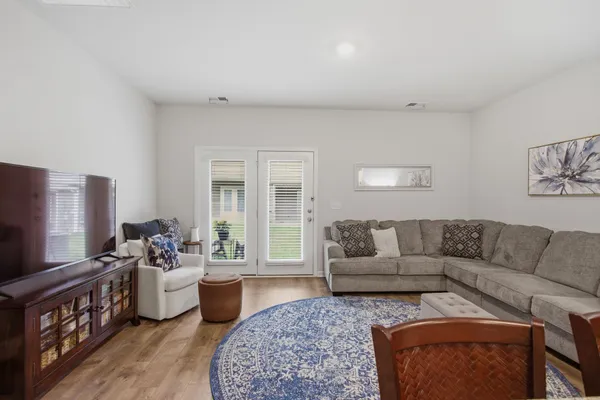 a living room with furniture and a couch