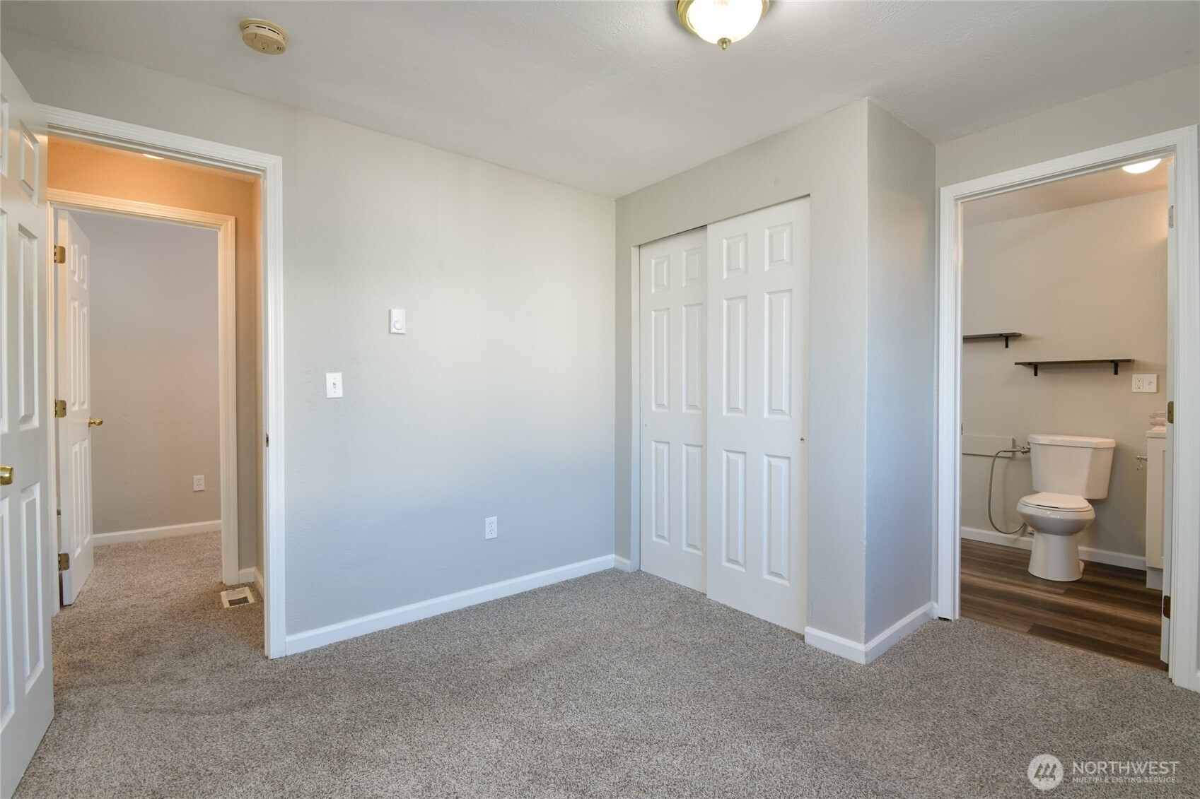 1702 South G Street Tacoma, WA 98405 - Photo 12 of 25 an empty room with a bathroom and a toilet