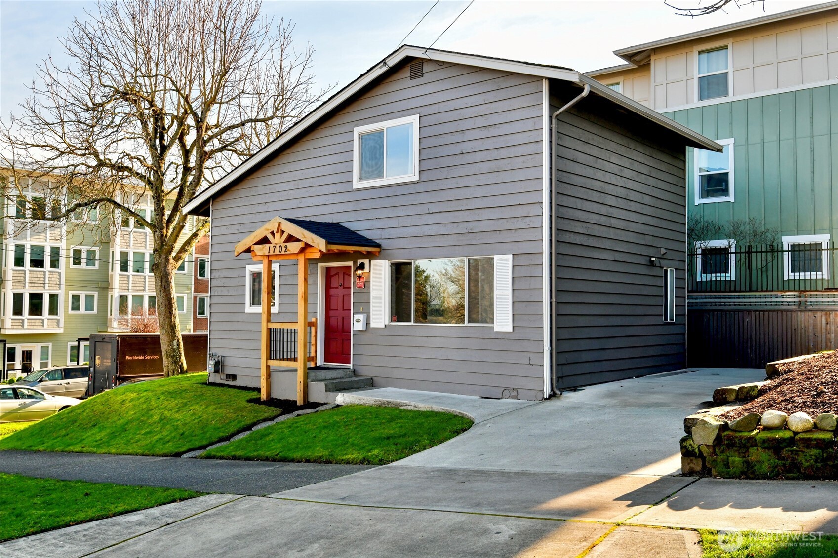1702 South G Street Tacoma, WA 98405 - Photo 18 of 25 a front view of a house with a yard