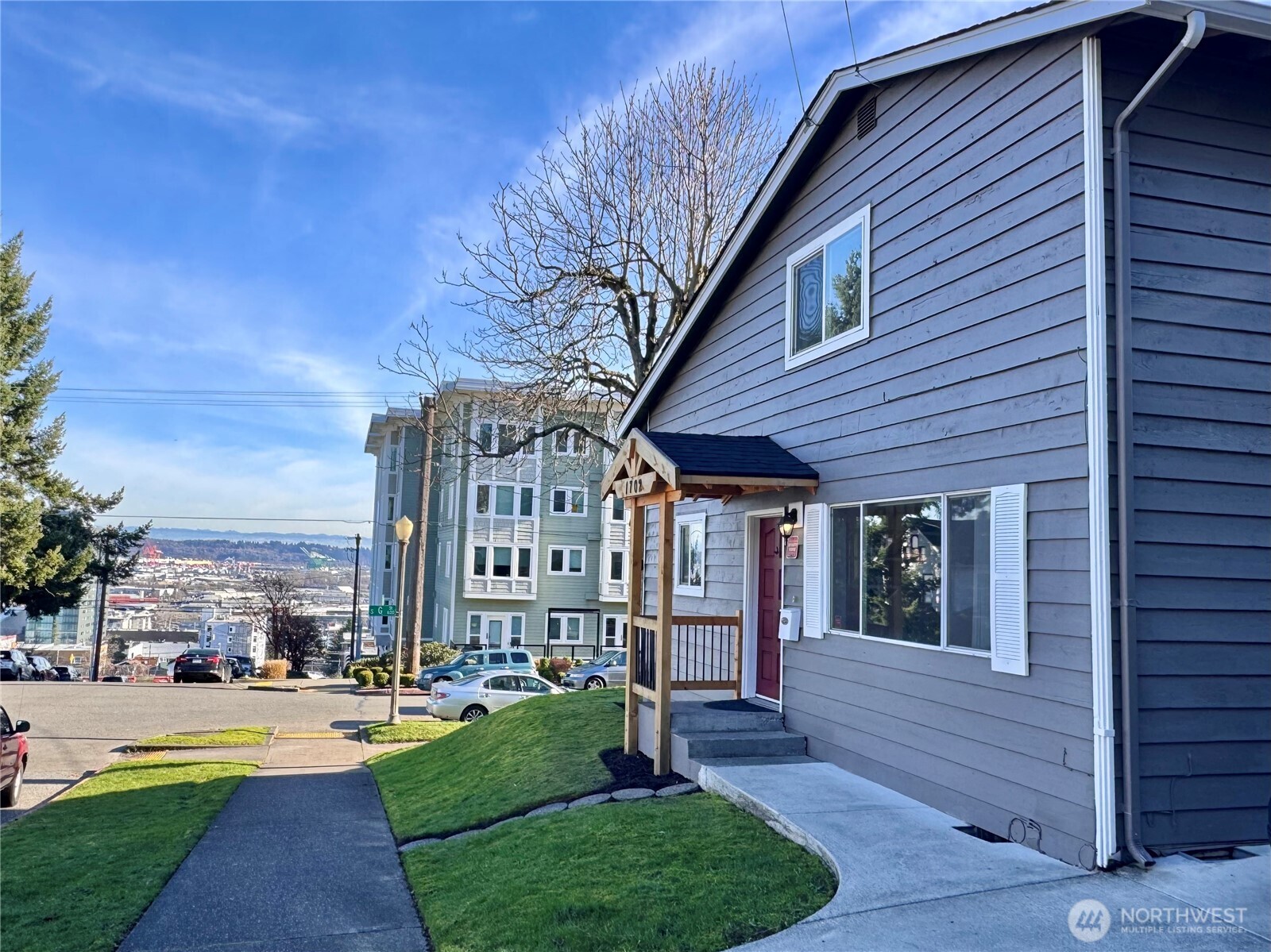 1702 South G Street Tacoma, WA 98405 - Photo 2 of 25 a view of a house with a yard