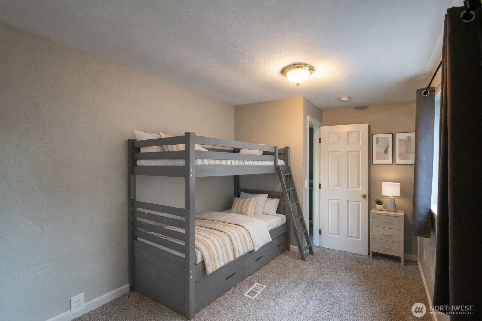 1702 South G Street Tacoma, WA 98405 - Photo 25 of 25 a bedroom with a bed and a refrigerator