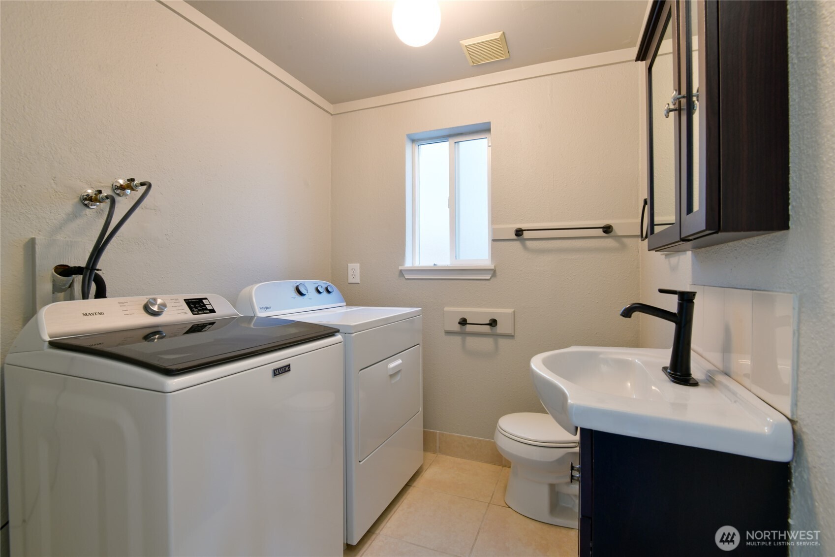 1702 South G Street Tacoma, WA 98405 - Photo 5 of 25 a bathroom with a sink and a toilet
