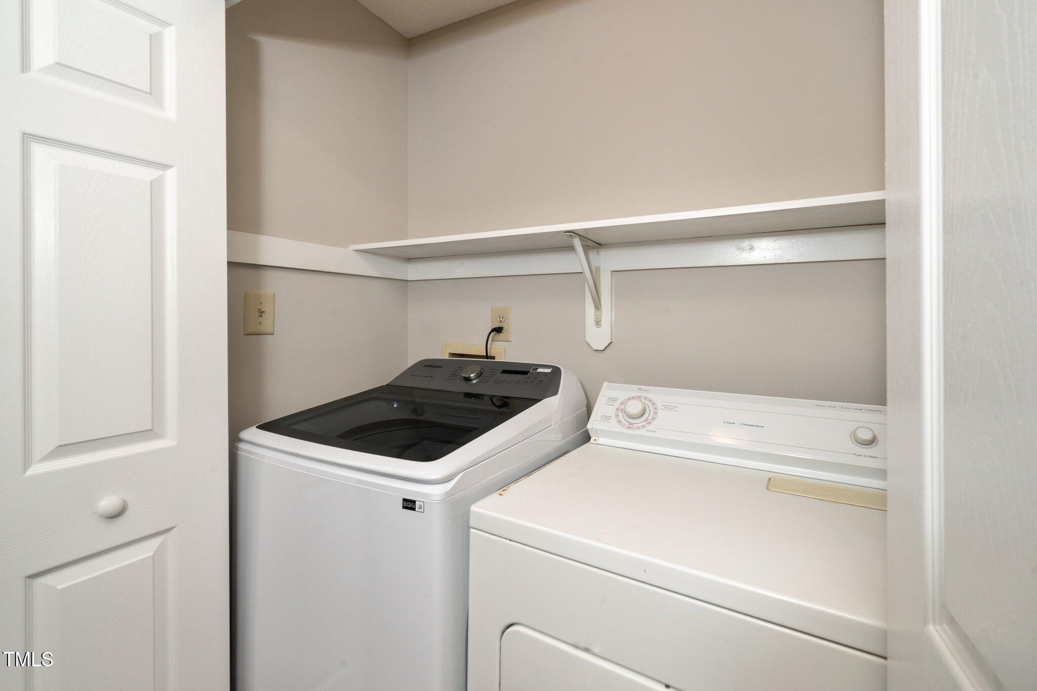 6016 Farm Gate Road Raleigh, NC 27606 - Photo 13 of 23 a utility room with dryer and washer