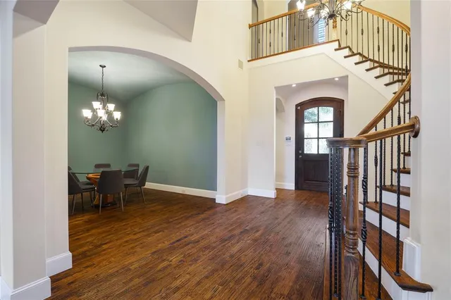 a view of a livingroom with furniture and wooden floor
