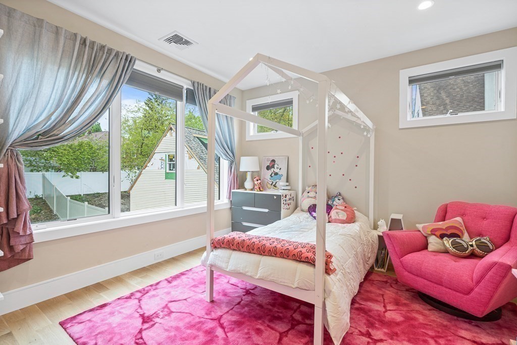 26 Salisbury Road, Unit 26 Newton, MA 02458 - Photo 14 of 27 a bedroom with a bed and a couch