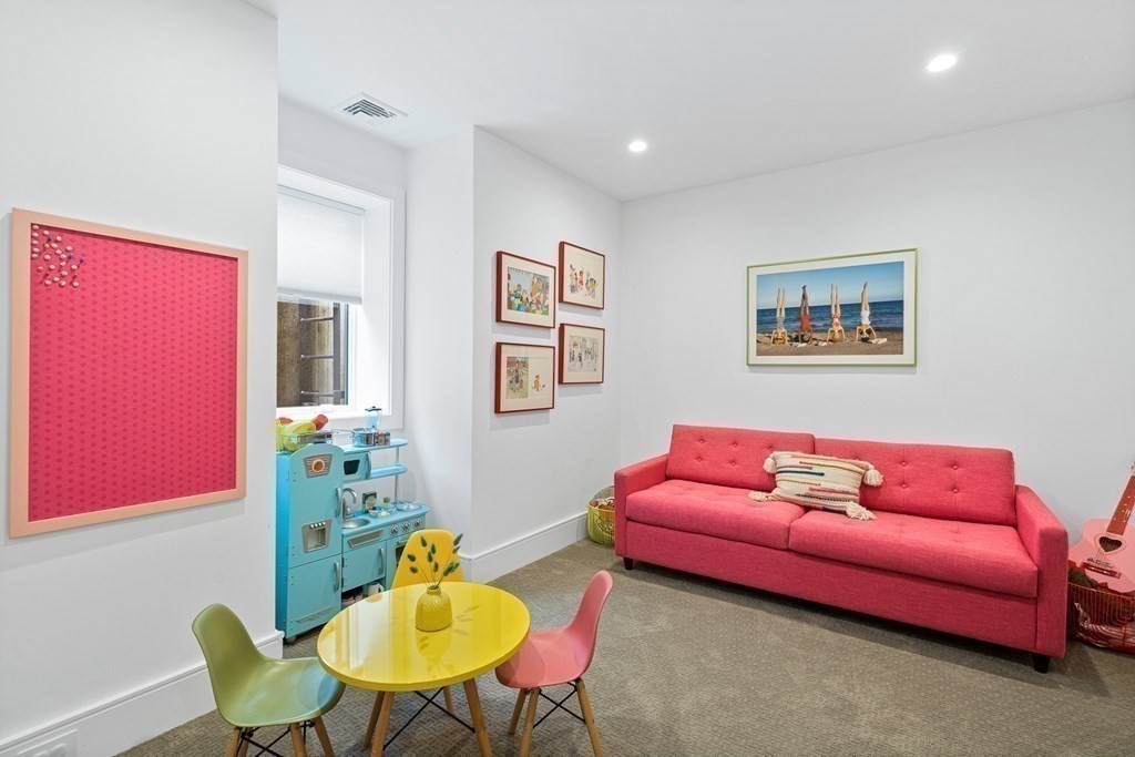 26 Salisbury Road, Unit 26 Newton, MA 02458 - Photo 18 of 27 a living room with furniture and a window