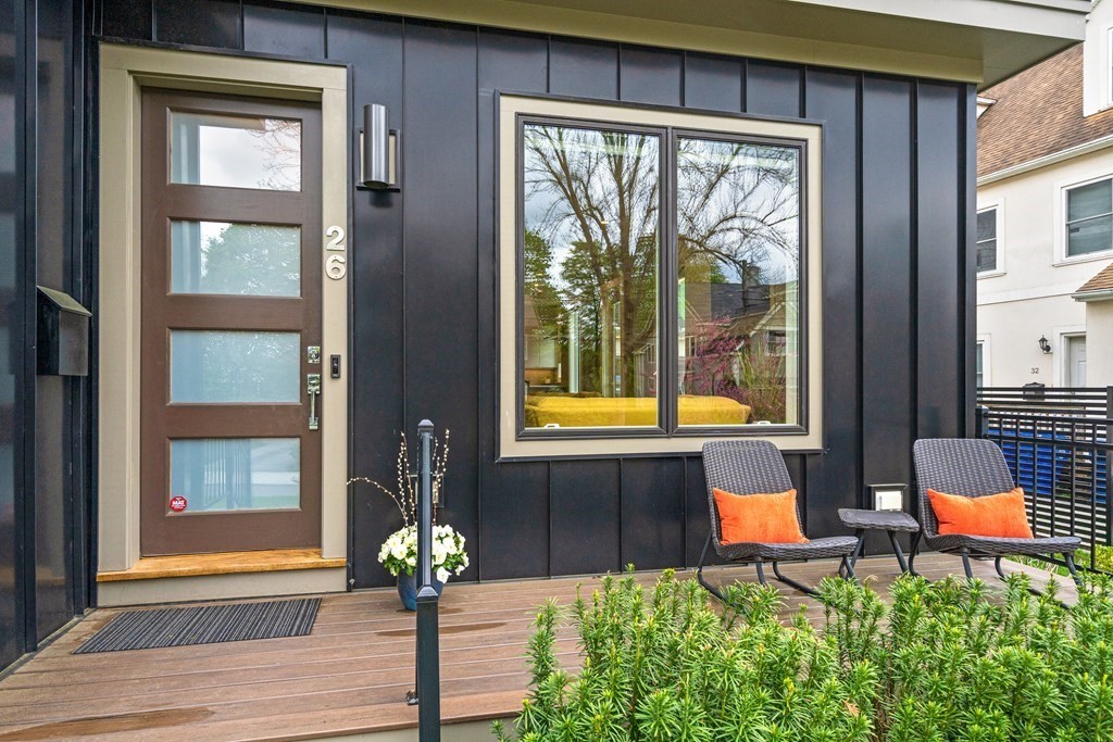26 Salisbury Road, Unit 26 Newton, MA 02458 - Photo 2 of 27 a living room filled with furniture and a potted plant