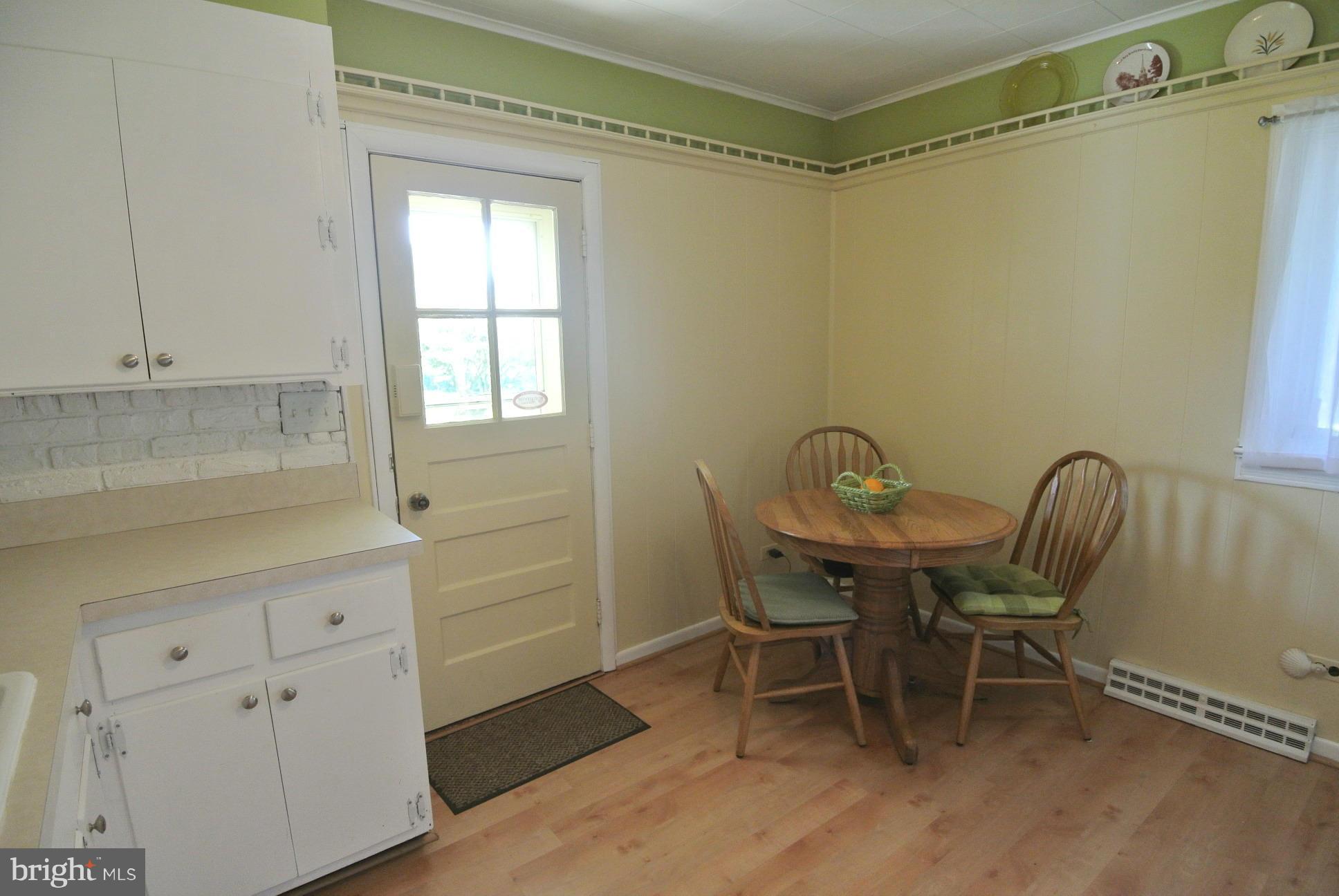 11824 Chapman Road Kingsville, MD 21087 - Photo 12 of 30 Brick and Paneled Walls, Storm Door to Front Yard