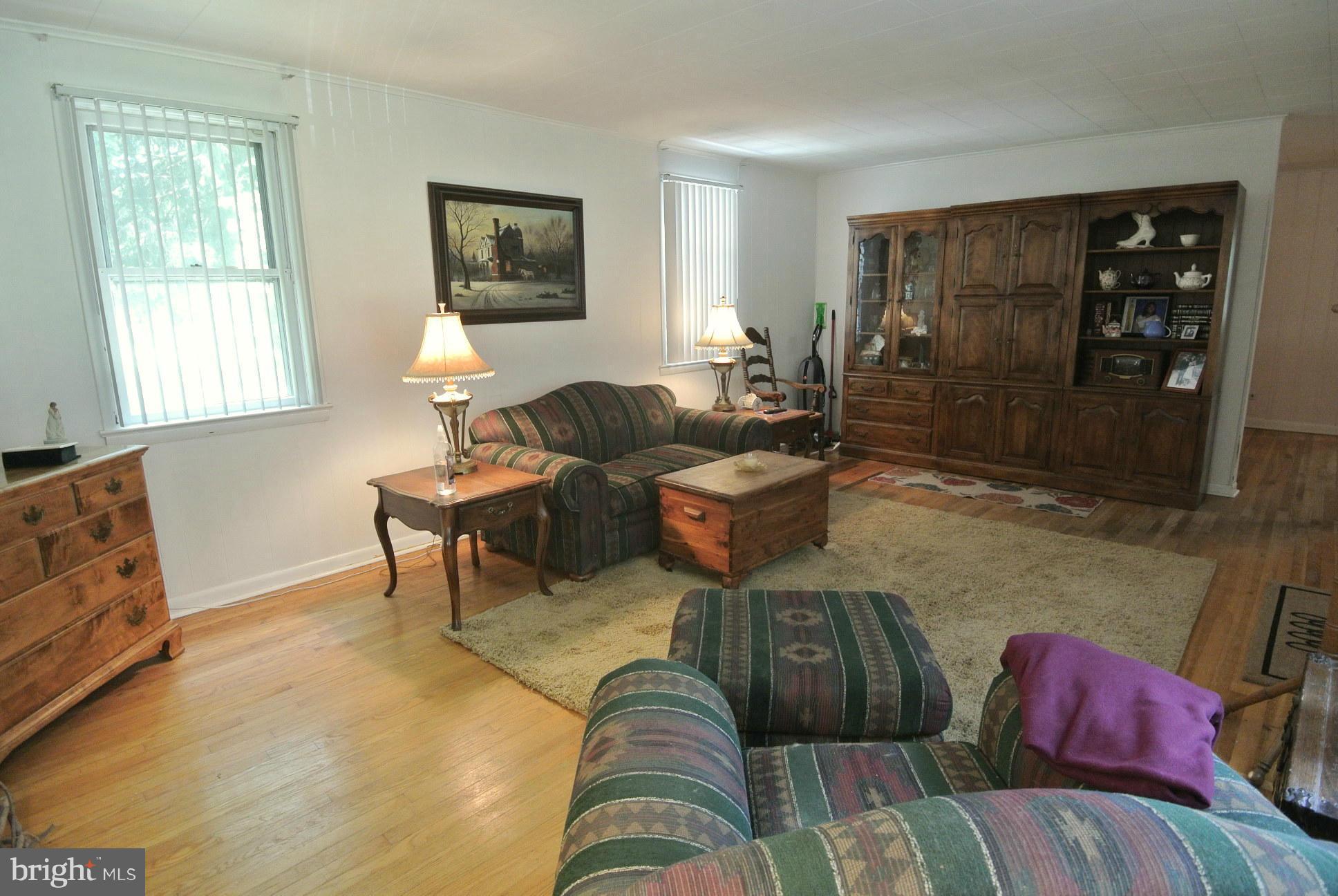 11824 Chapman Road Kingsville, MD 21087 - Photo 8 of 30 Orig. Hardwood Floors, Knotty Pine Paneled Walls