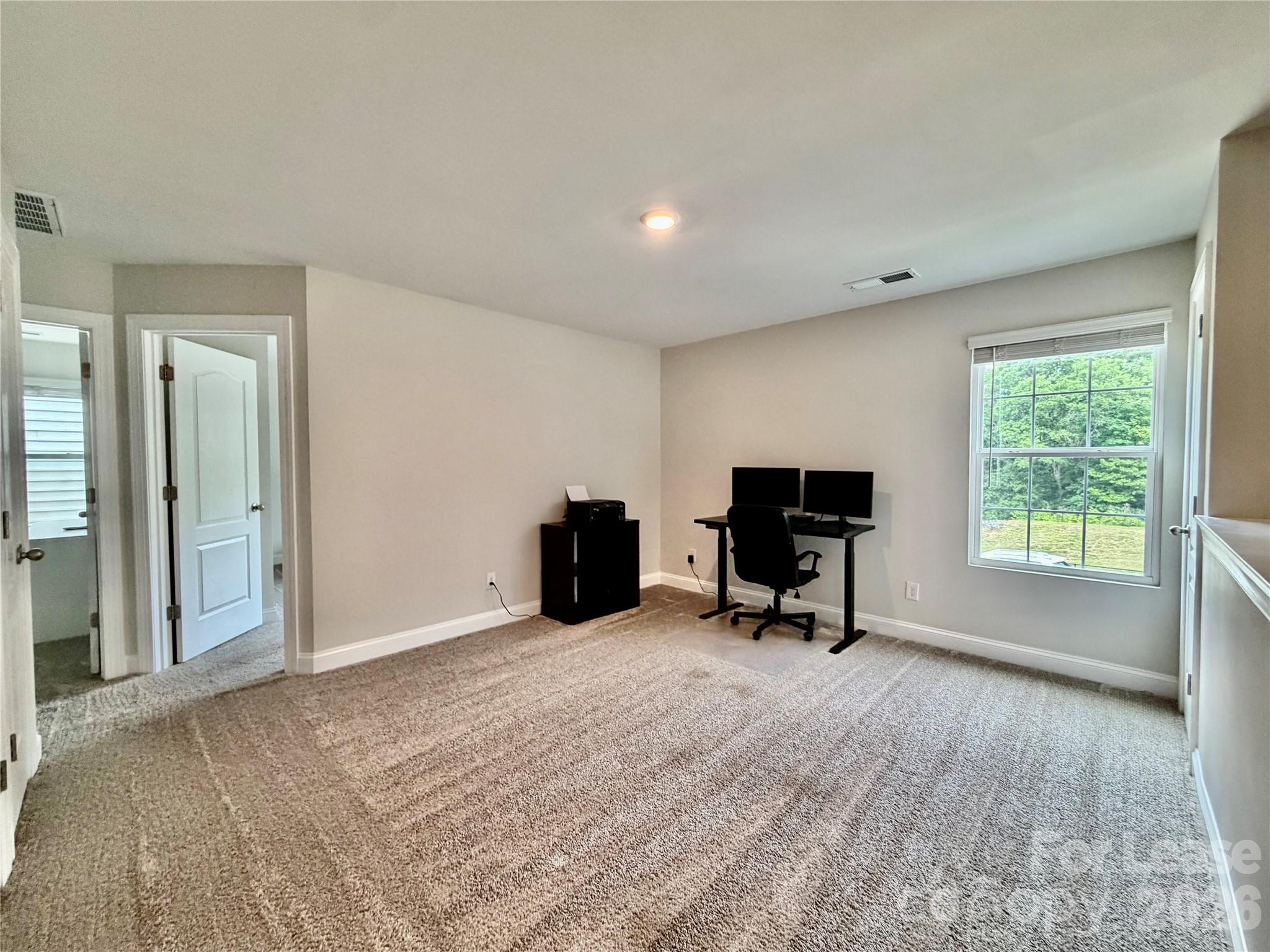 1220 Pecan Ridge Road Fort Mill, SC 29715 - Photo 10 of 25 a living room with furniture and a fireplace