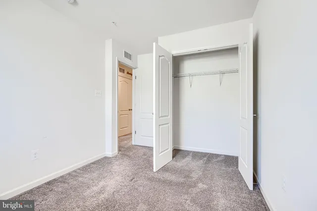 an empty room with closet