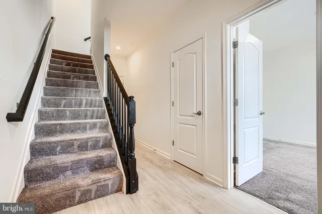 a view of an entryway with staircase