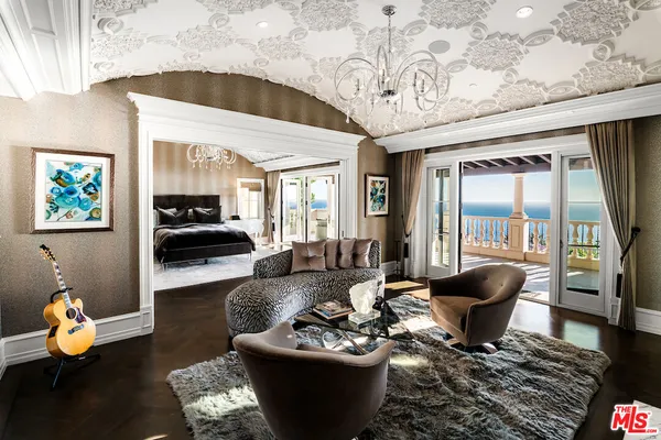 a view of balcony with furniture