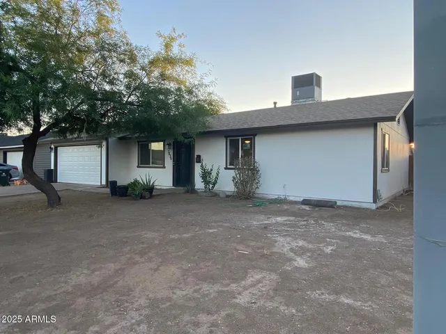 a view of an empty room and entryway