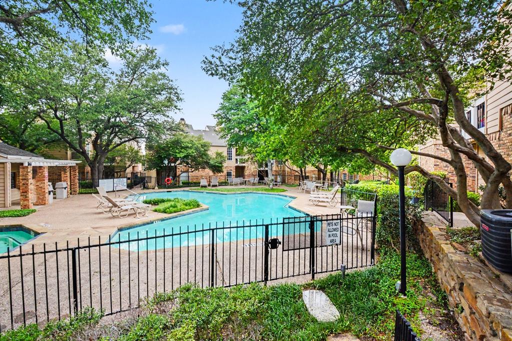 14277 Preston Road, Unit 315 Dallas, TX 75254 - Photo 5 of 20 Community pool just steps from patio, ideal for relaxing and entertaining.