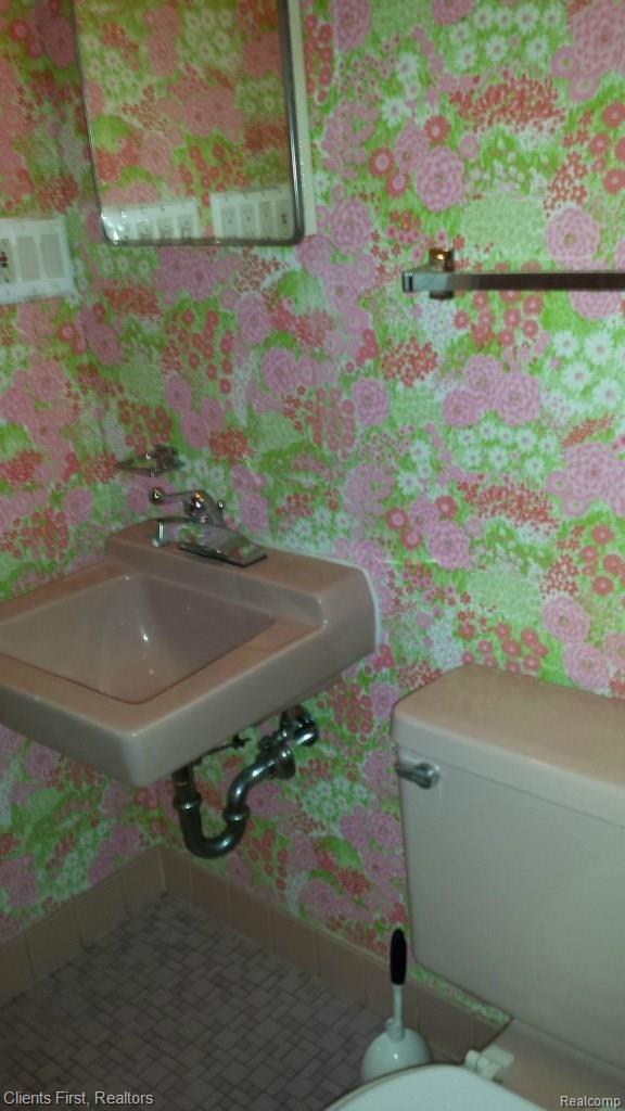 29721 Fall River Road Southfield, MI 48076 - Photo 21 of 26 half bath lower level