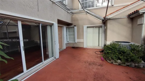 a view of a house with a glass door