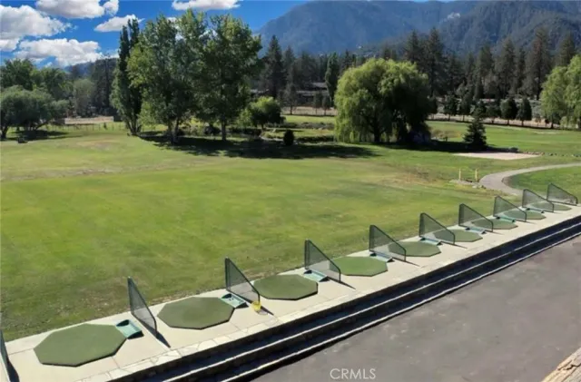a view of swimming pool from a balcony