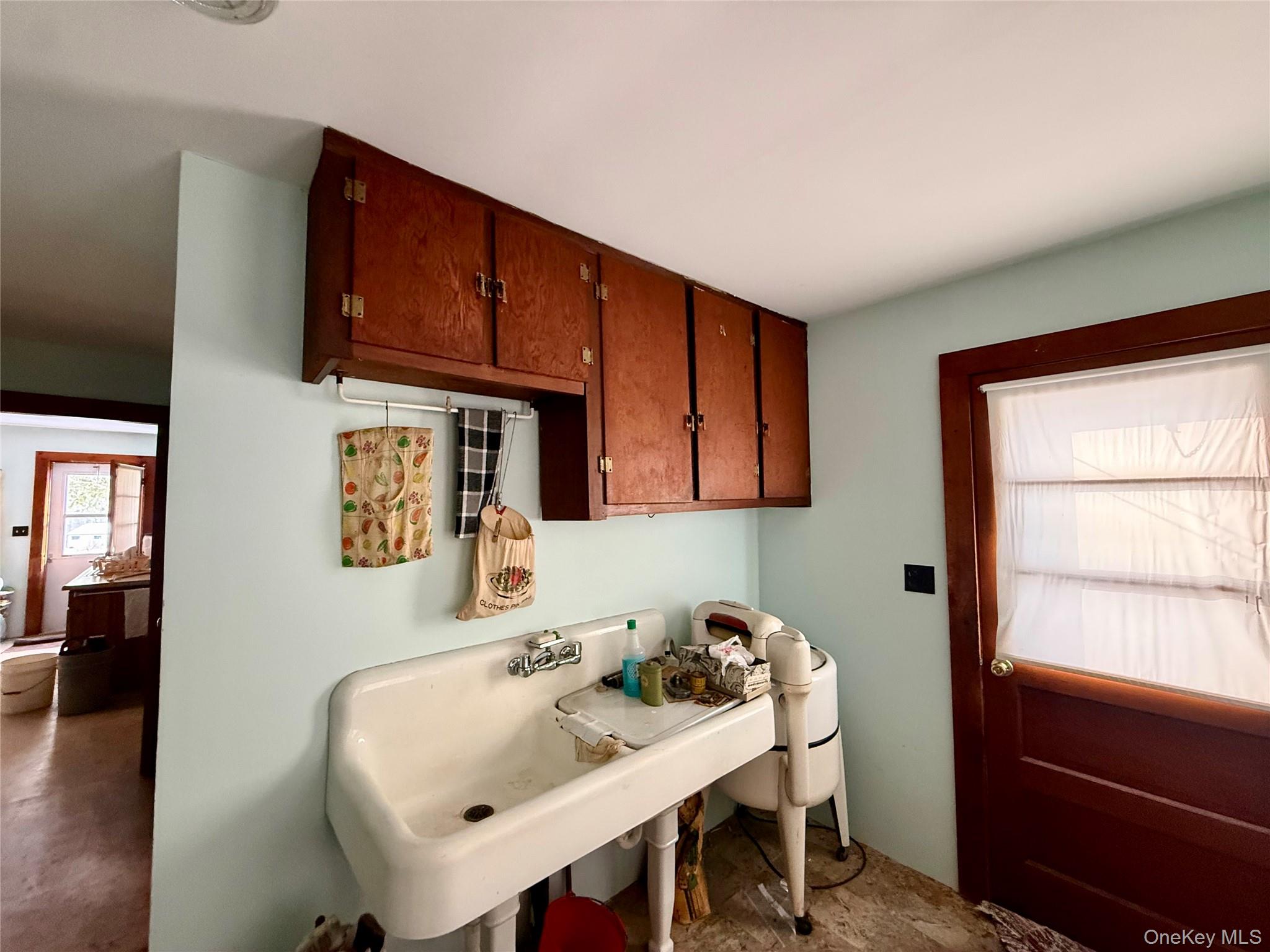 111 Mail Road Barryville, NY 12719 - Photo 19 of 34 Laundry room featuring a sink