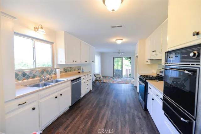 a large kitchen with a lot of counter space