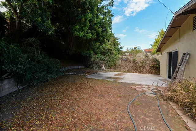 a view of a chairs and tables in the patio