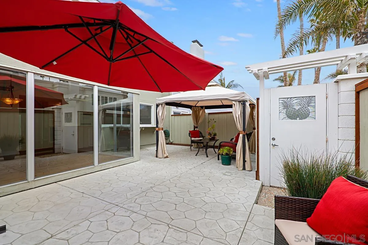 69 Half Moon Bend Coronado, CA 92118 - Photo 23 of 45 a view of a house with backyard and sitting area
