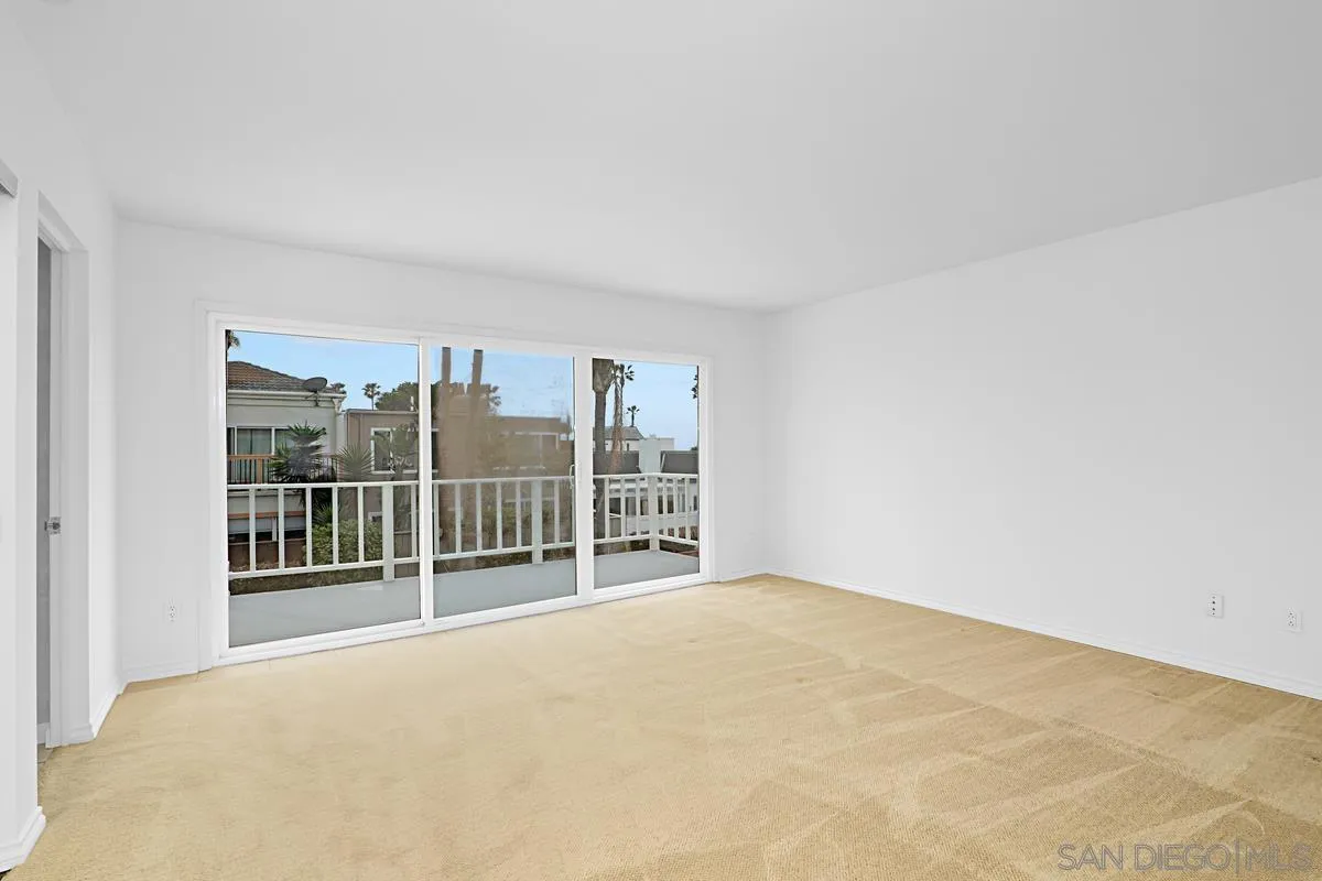 69 Half Moon Bend Coronado, CA 92118 - Photo 26 of 45 a view of an empty room with a balcony