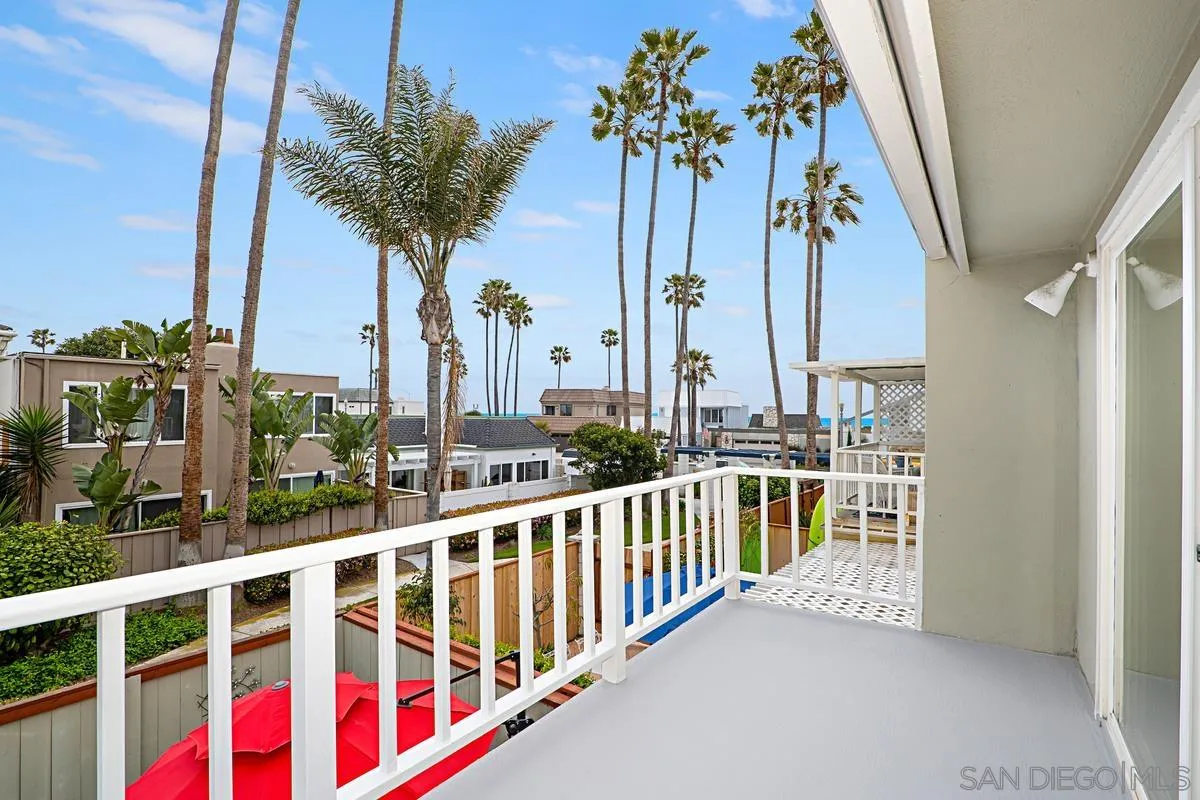 69 Half Moon Bend Coronado, CA 92118 - Photo 28 of 45 a view of a palm tree from a balcony
