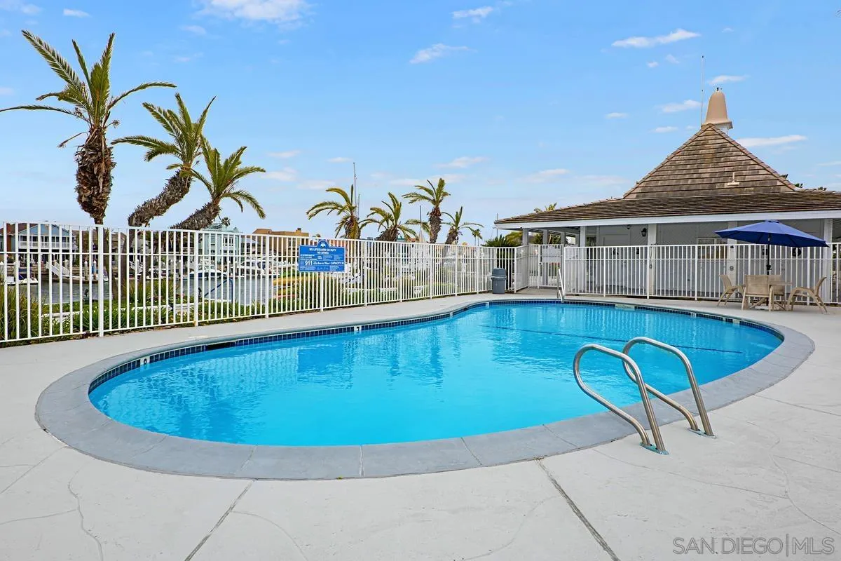 69 Half Moon Bend Coronado, CA 92118 - Photo 40 of 45 a view of a swimming pool with a lounge chair