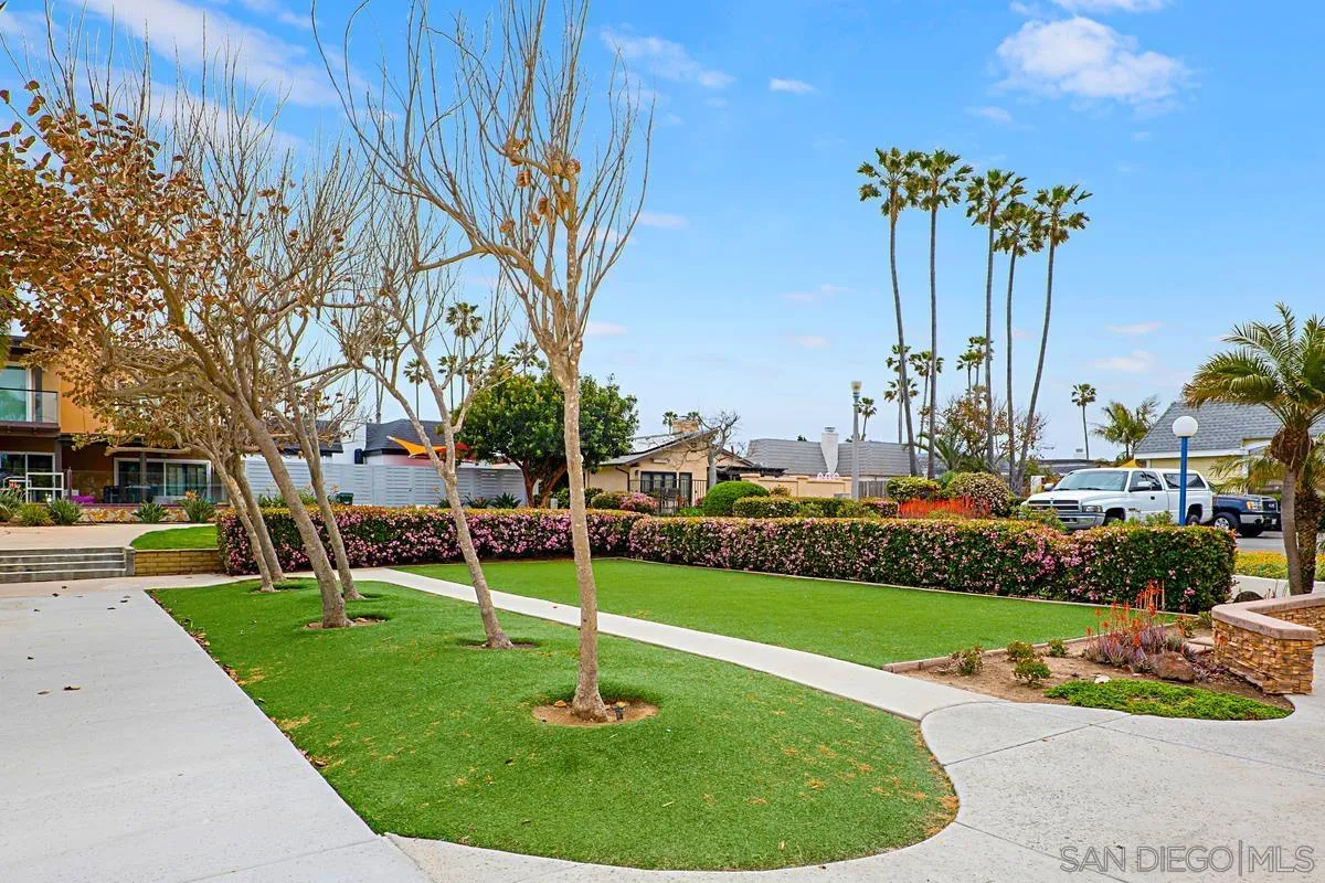 69 Half Moon Bend Coronado, CA 92118 - Photo 43 of 45 a view of a garden with a slide