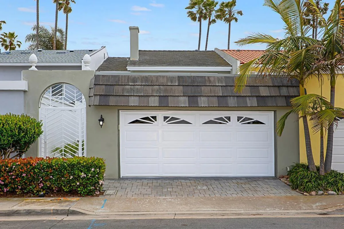 69 Half Moon Bend Coronado, CA 92118 - Photo 6 of 45 a front view of a house with plants