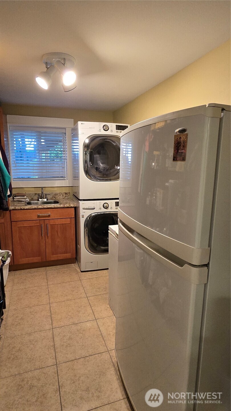 16342 72nd Avenue West Edmonds, WA 98026 - Photo 26 of 40 a kitchen with a refrigerator and a microwave