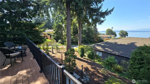 a view of balcony and wooden deck